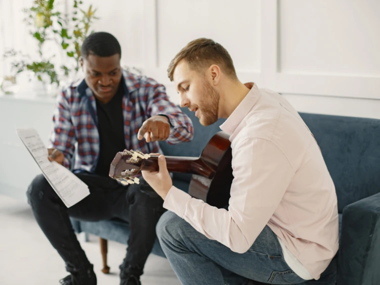 A high-quality photo of an adult music class in action