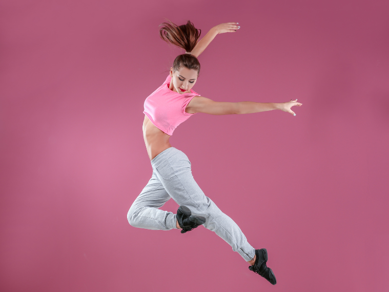 Dancer performing a fusion dance routine combining ballet and hip-hop styles