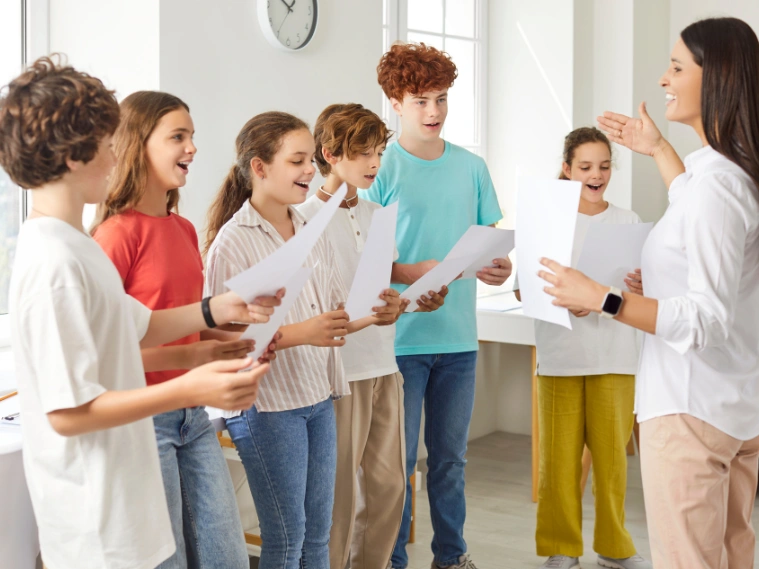 Teens practicing a fun song during a vocal lesson