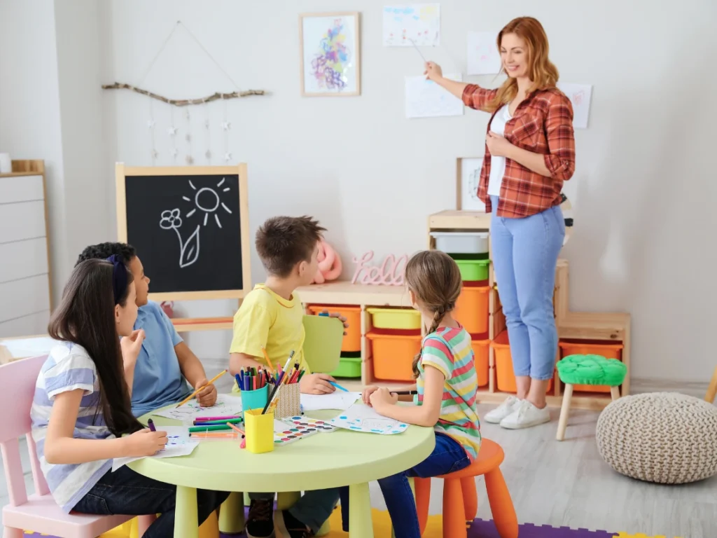 Art instructor guiding students in a California drawing class focused on developing foundational and advanced drawing techniques